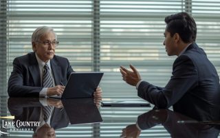 One-on-one advisory meeting focused on business transition planning.